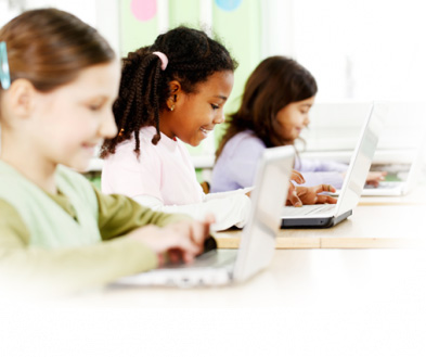 children taking test on computers